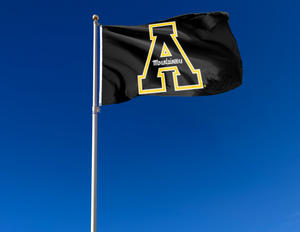 Black 3x5 foot wide Appalachian State University Flag with black A Mountaineers Logo and Two metal grommets attached to flagpole waving in the wind