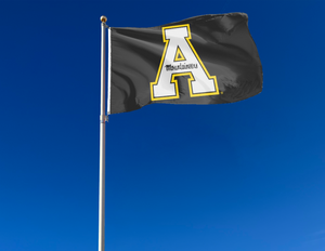 Black 3x5 foot Appalachian State University Flag with A Mountaineers logo and Two Metal grommets attached to a flagpole waving in the wind