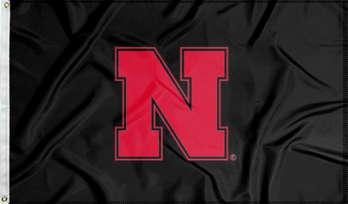 Black three by five foot University of Nebraska Applique Flag with two metal grommets