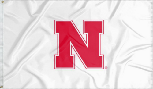 White three by five foot wide University of Nebraska Lincoln Applique flag with two metal grommets for indoor home decor or outdoor home decor